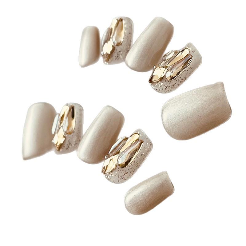 Jingyue Si Handmade Nude Rhinestone Press-on Nails - Light Luxury Manicure Stickers in Milk Tea Color with Cat Eye Tips