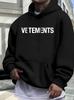 Casual VETEMENTS Print Hoodie - Cozy Fleece-Lined Fall/Winter Sweatshirt with Front Pocket