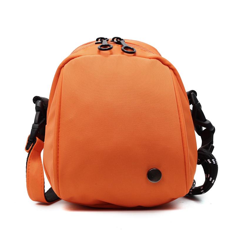 Japanese casual niche design, simple and foreign, personality, portable small satchel, fashion travel, fashion small round bag girl