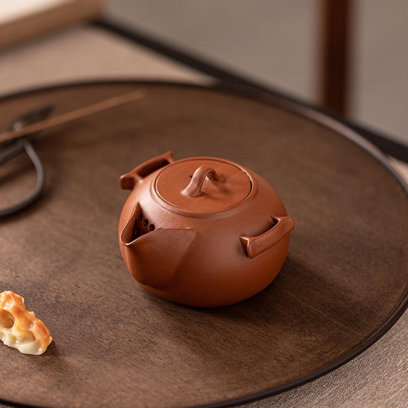 Raw ore purple sand master handmade retro hand-held teapot Zhu mud handmade teapot high-end household one-person drinking teapot