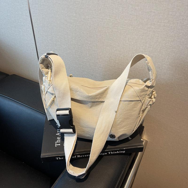 Korean version of casual nylon canvas bag women's 2025 new simple dumpling bag versatile shoulder messenger bag