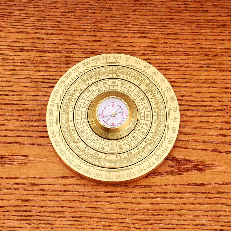 

Brass Multifaceted Gyroscope Bagua Compass with Copper Handle Ornament