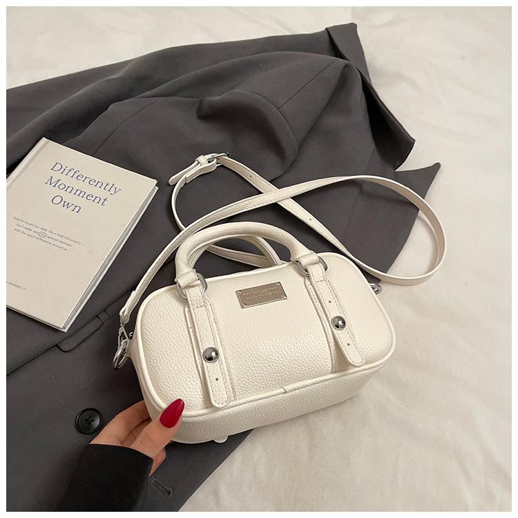 

Корейская текстура портативная сумка для боулинга женская 2025 ранняя весна новая корейская нишевая сумка Boston в иностранном стиле сумка-мессенджер