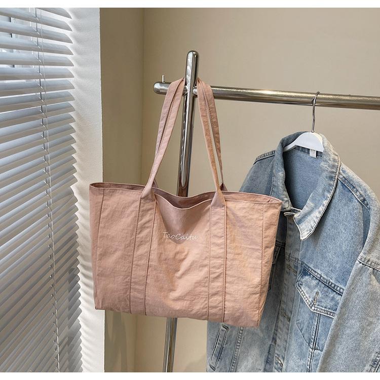 

Premium canvas tote bag 2025 new fashionable versatile shoulder bag to work portable commuter large-capacity bag