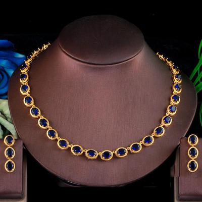 Orecchini con collana ovale in zirconi ovali blu reale color oro giallo CMM
