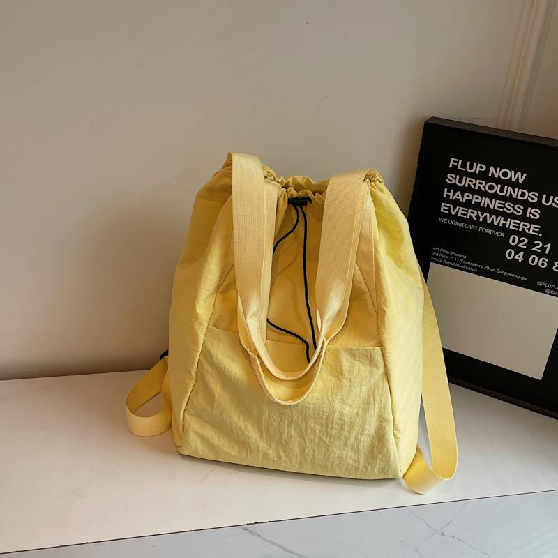 Schoolbag Fashion Drawstring Backpack Women's 1011 Spring New Simple Handheld Shoulder Bag Large Capacity Travel Backpack