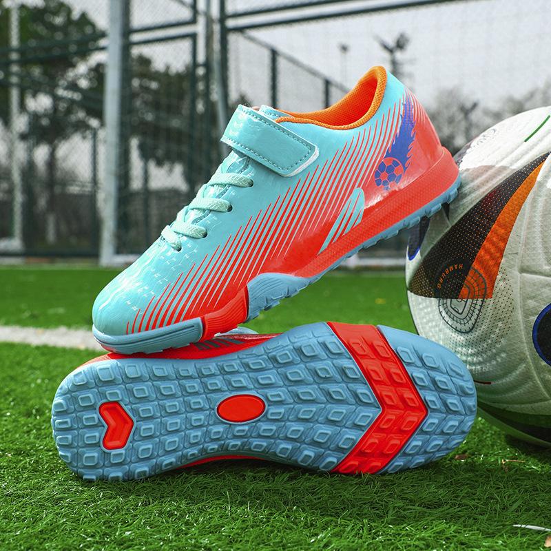 2025 new children's football shoes boys and students girls broken nails Velcro casual game sports shoes