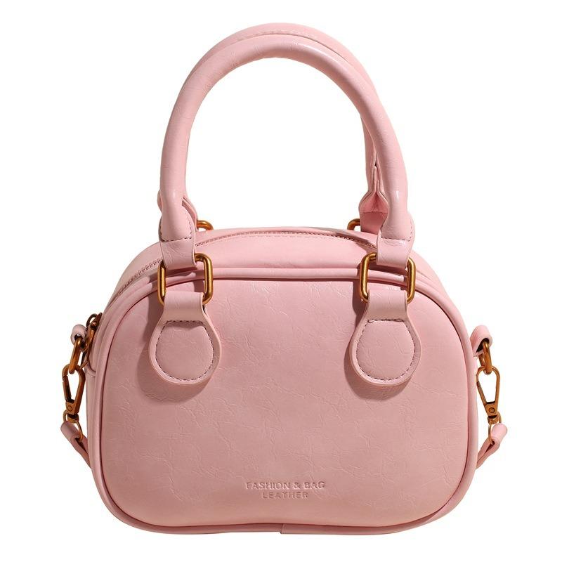 Temperament retro senior sense portable bowling bag versatile commuting niche casual simple wind messenger women's bag