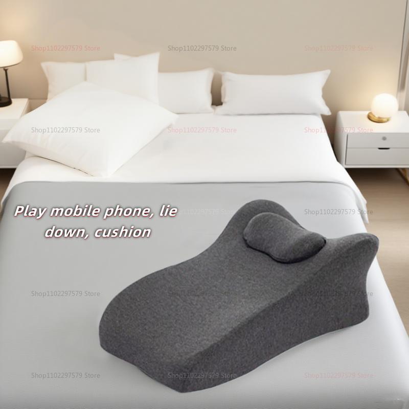A Multifunctional Cushion/Pillow With A Pillow. Lying On The Pillow Playing With Your Phone To Relieve Fatigue