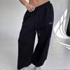 Calças esportivas listradas femininas europeias e americanas soltas de perna larga para primavera e outono