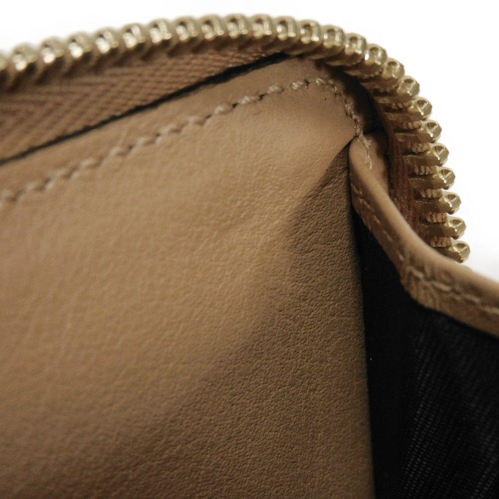 Used Guccissima Coin Purse 9539 544249 BMJ1G 2754 7943 with Embossed Double G Logo and Zip Around Closure, Micro GG