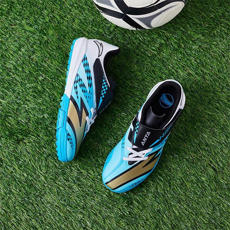 Anta Kinder Synthetisches Leder Bequem Einfach Rutschfest Verschleißfest Low-Top Fußballschuhe Kinder Sneaker Blau Schwarz Gold 312432222-2