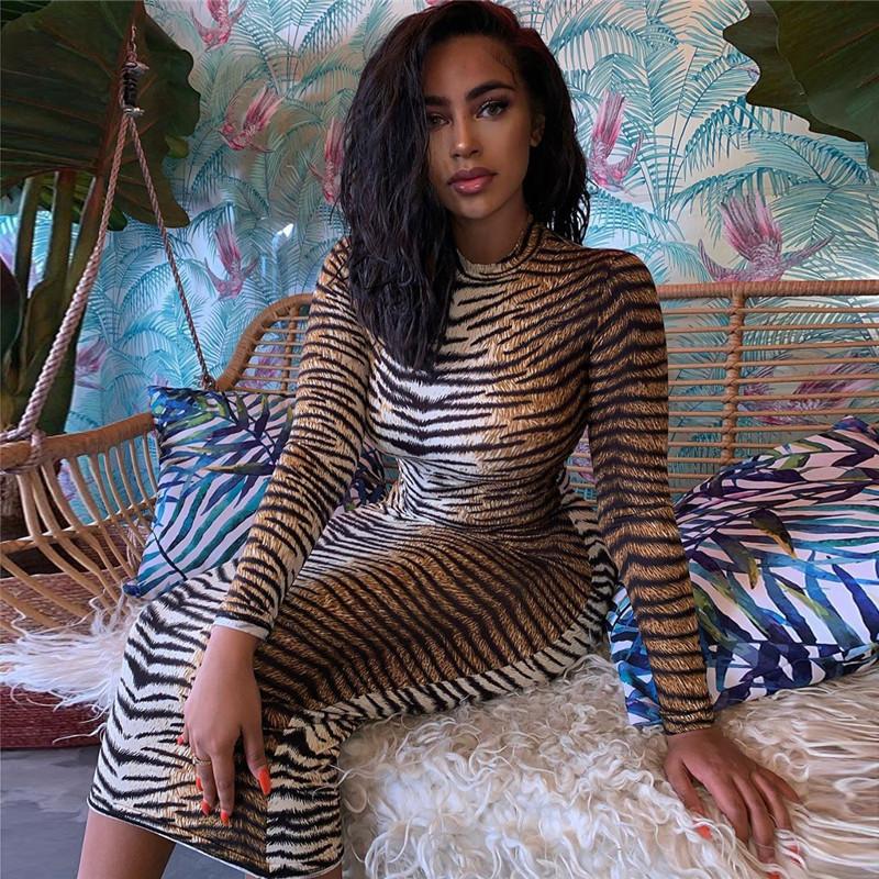 Nové šaty s dlouhým rukávem a sukně střední délky pro dámské oblečení od jara a podzimu