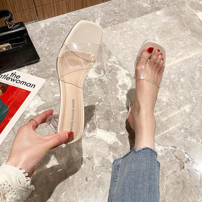 Wear high-heeled slippers 2025 women's spring one-word open-toed transparent crystal thick-heeled cool slippers show height
