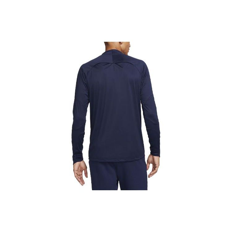 Nike Maglia da allenamento a maniche lunghe da calcio Paris Saint-Germain Strike Winter Warrior con logo stampato Uomo top Blu navy DX2863-499