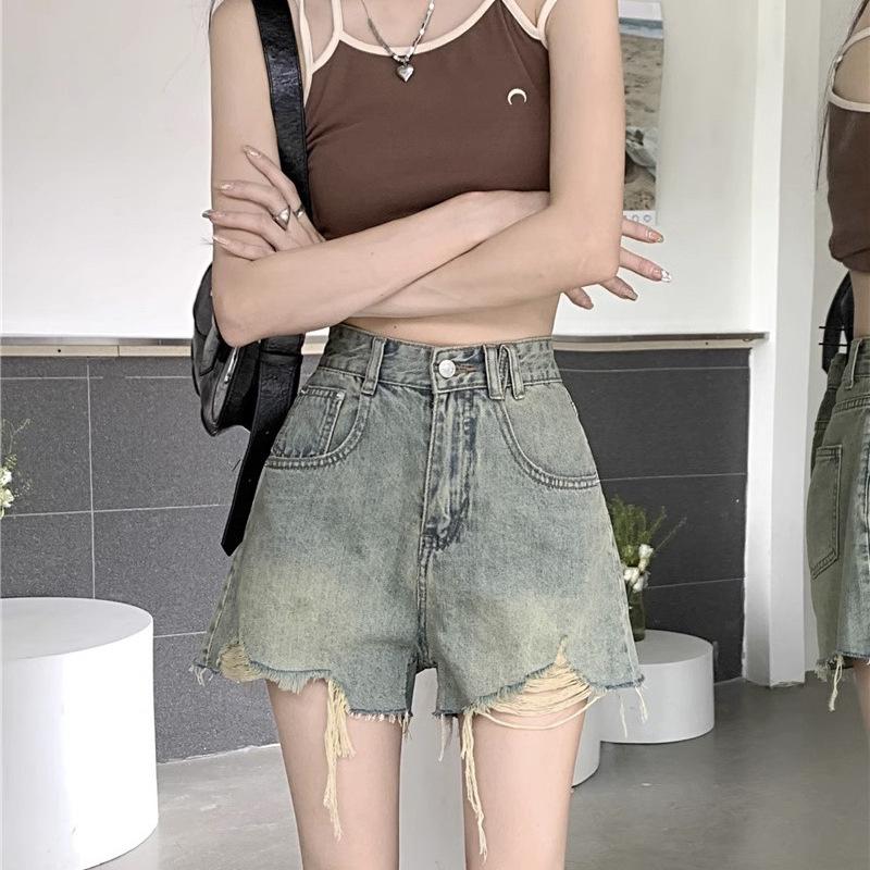 

Новые женские джинсовые шорты с высокой талией в стиле ретро, с рваным эффектом и широкими штанинами, создающими стройнящий силуэт, 2023 Medium