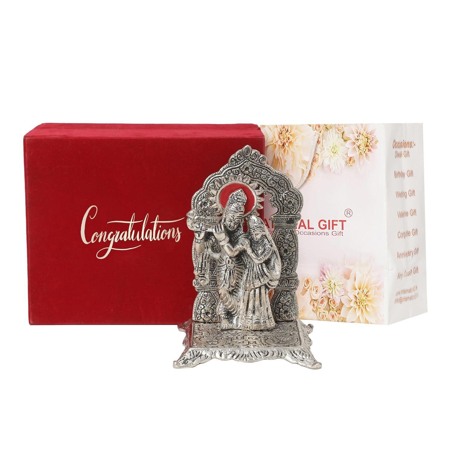 

Silver Radha Krishna Chowki Idol Showpiece | Congratulations Tag with Velvet Box & Carry Bag | Ideal for Diwali,