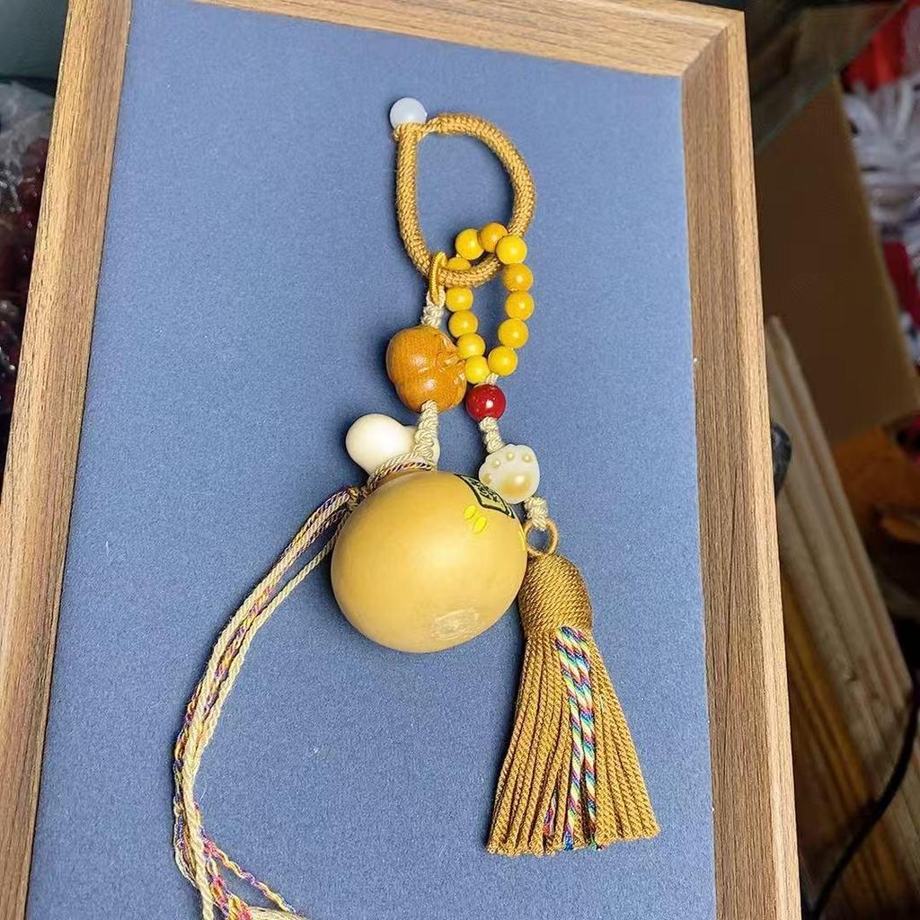 Handmade Natural Seed Shell Rattle Wind Chime: Sound Healing Plant Pendant for Backpack or Car Ornament