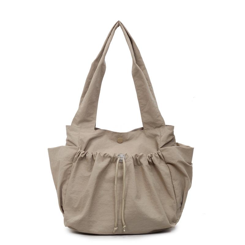 Japanese niche pleated tote bag women's large capacity 2025 summer new fashion simple casual commuter shoulder bag