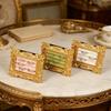 Tabletop Jewelry Display Holder with Ornate Frame, Four Ring Rows for Counter Merchandising, Vanity Storage, and Styling Use