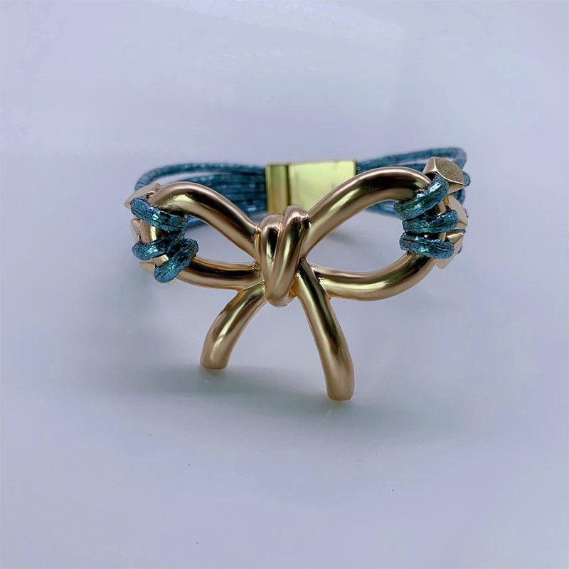 Modna europejska i amerykańska skórzana bransoletka z magnetycznym zapięciem w kształcie kokardy - Modna biżuteria damska na Boże Narodzenie