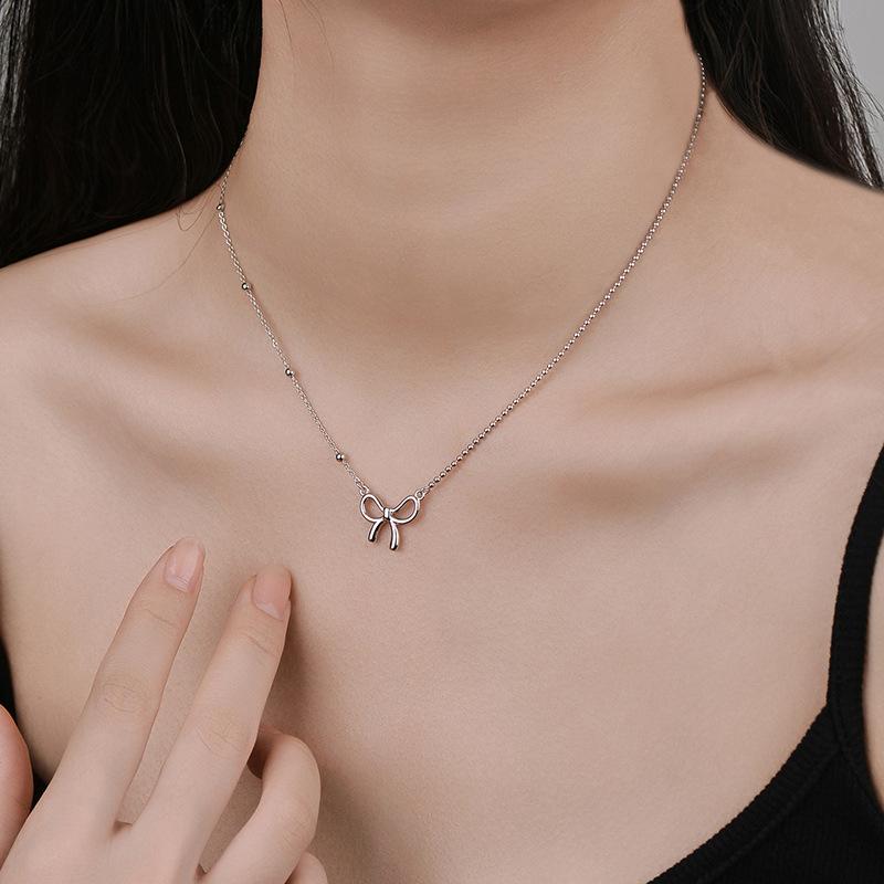 Sweet Hollow Bow Necklace Asymmetric Chain Necklace New Style