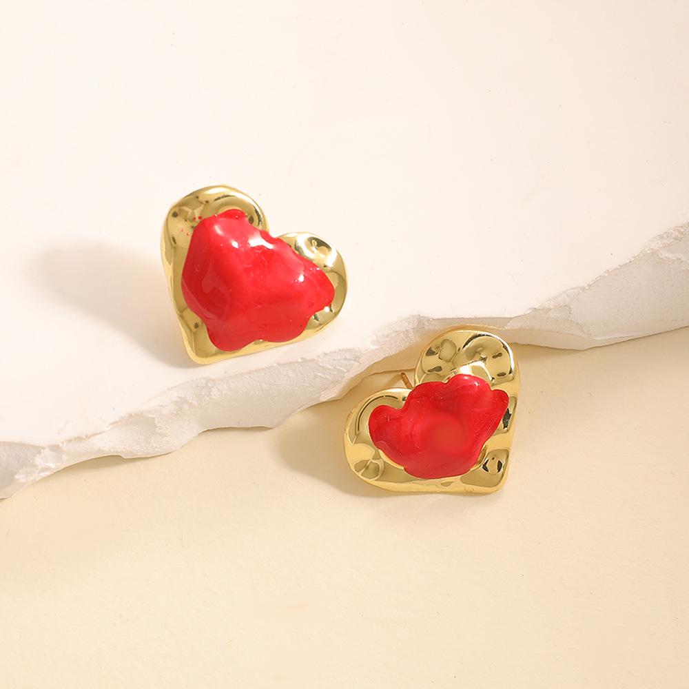 Japan and Korea simple design love stud earrings niche versatile hollow earrings stainless steel dripping oil cold wind women's earrings