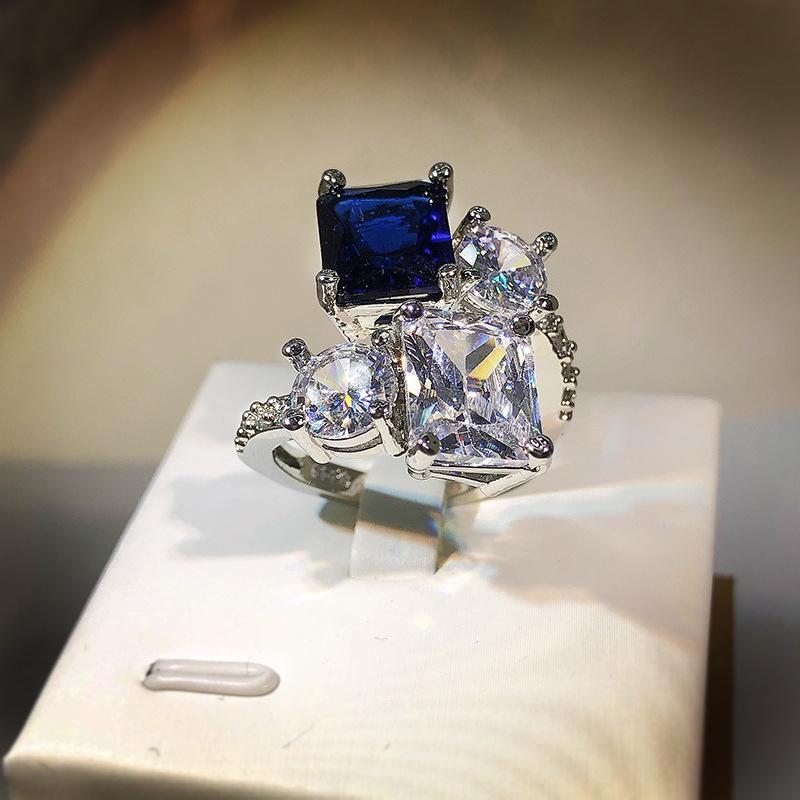 Luxury high carbon diamond ice flower cut engagement ring female  silver dark blue zircon irregular opening ring party gift