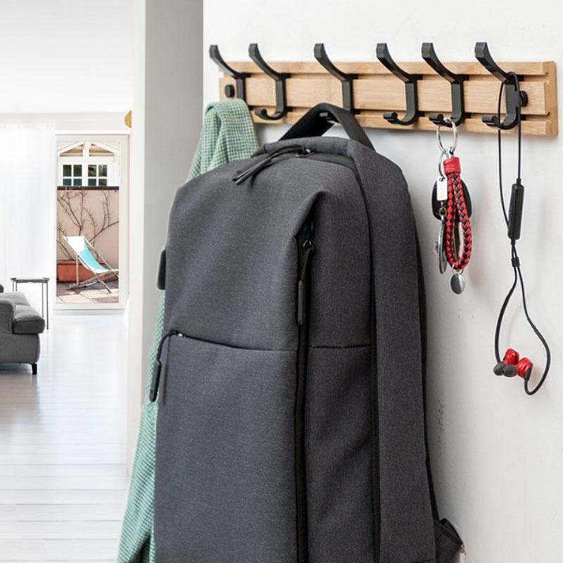 wall mounted backpack rack