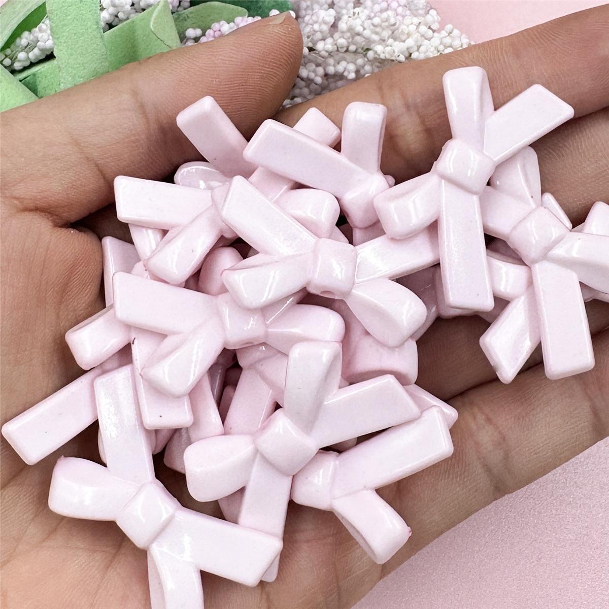 

Высококачественные ювелирные аксессуары своими руками, подвески, свободные бусины, акрил, 50 шт., цветной однотонный бант, 20,4*34,2 мм, для изготовления браслетов, ожерелий, мода светло-розовый