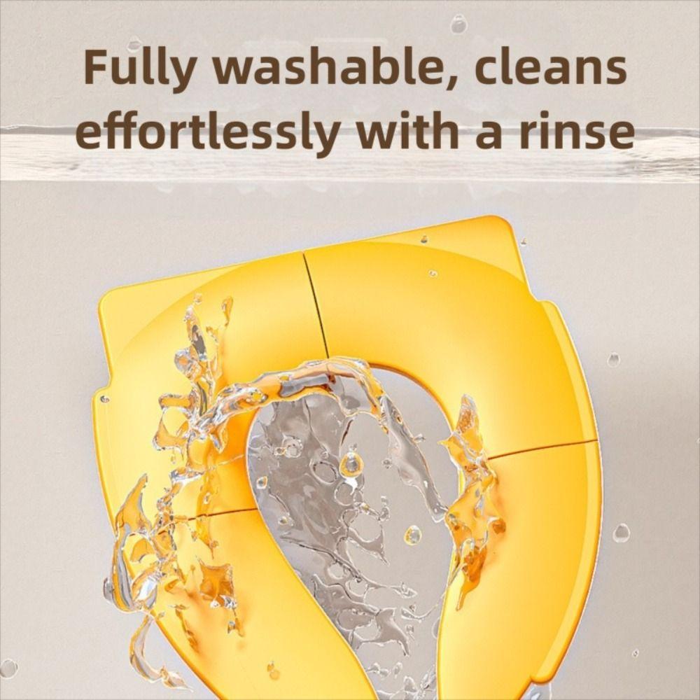 Einfarbiges Baby-Reise-Toilettensitz-Kissen faltbar für Kinder Urinalkissen für 0-7 Jahre