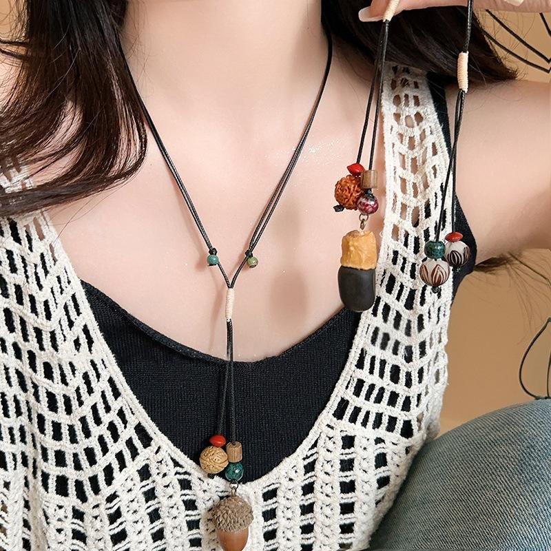 New Chinese ceramic acorn pendant woven rope necklace women's retro ethnic long collarbone chain niche design neck chain
