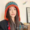 Handmade women's knitted headgear autumn and winter color fringed ball lace-up ear protector hollow knitted wool cap