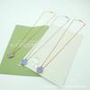 Four-Leaf Clover Pendant Necklace with Mother-of-Pearl and Agate On a Double-Sided Clavicle Chain