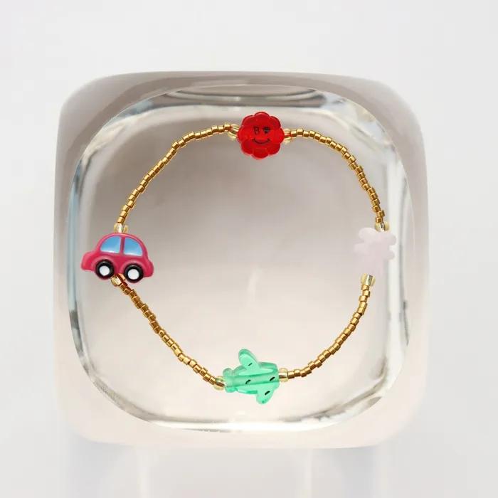 Unique and fun charms gold beads Bracelet Color motif charm gold bead bracelet (band type, hook type)