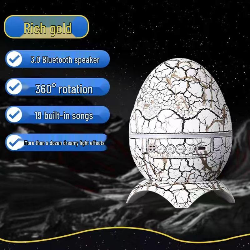 Dinosaur Egg Table Lamp and Projector: Starry Sky and Nebula Light with Remote-Controlled Speaker for Nighttime Ambiance.