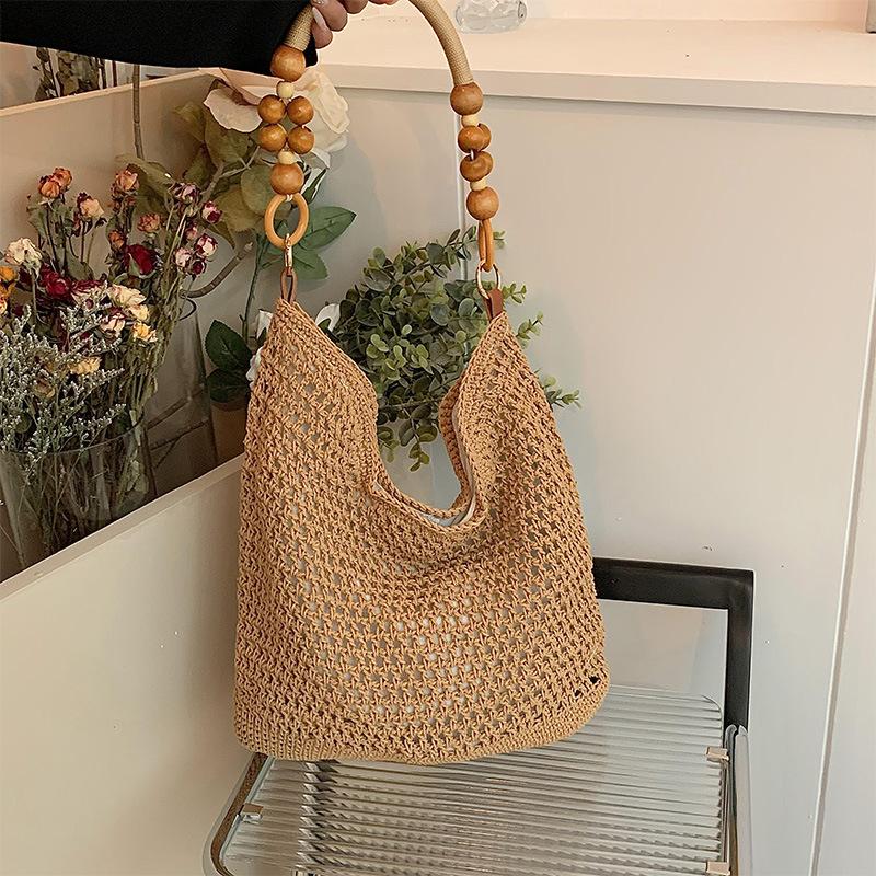 

Повседневная большая вместительная хлопковая плетеная сумка из ниток, новая полая сумка ручной работы через плечо, пляжная сумка для отпуска, универсальная женская сумка