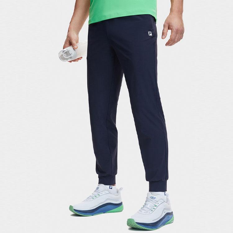 FILA Fitness Series Solid Color Mid-Rise UV Protection Tapered Knit Sports Pants Men bottoms Dark-Blue A11M421618F-NV