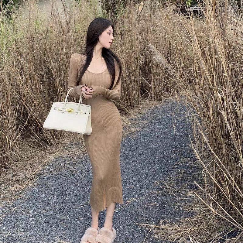 Autumn and winter new temperament horn sleeves pure desire wind bottom hip long dress retro slim and thin knitted dress women
