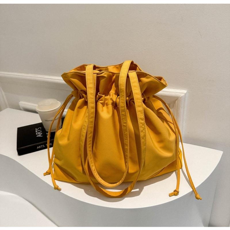 New Japanese and Korean Harajuku Oxford cloth large capacity solid color fashion casual drawstring pleated bucket shoulder bag