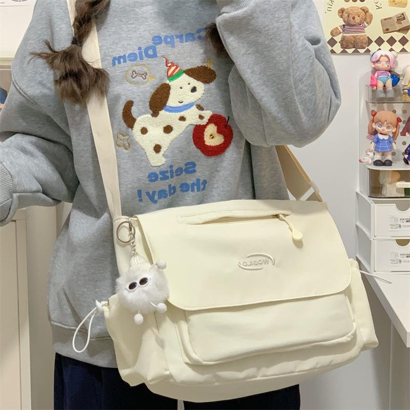 Simple tooling messenger bag women's large-capacity junior and high school make-up bag, lightweight trendy and casual shoulder messenger bag