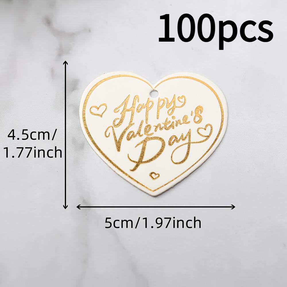 

100pcs Valentine s Day Gift Tags with Golden Foil Lettering, Heart-Shaped Happy Valentines Paper Hangtags for Wrapping as shown