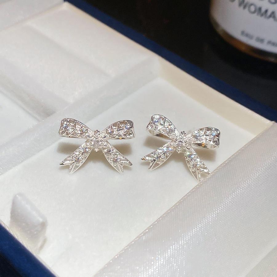 

Elegant Silver Bowknot Zircon Stud Earrings for Women – Light Luxury & Versatile Design