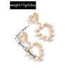 Casual sweet love pearl earrings light luxury high sense temperament versatile hollow love stud earrings women