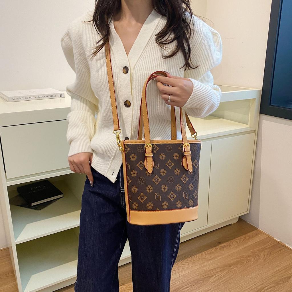 Bucket bag women's new retro simple niche high-end women's handbag diagonal span small women's bag