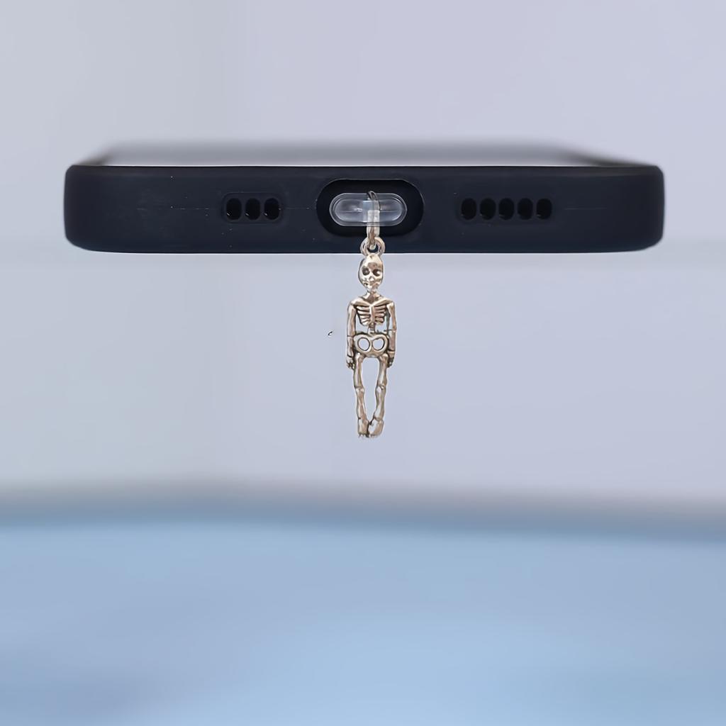 1 Stück Totenkopf-förmiger Handy-Staubschutzstecker, geeignet für iPhone/Typ-C, ausgefallenes Geschenk für Ladeanschluss