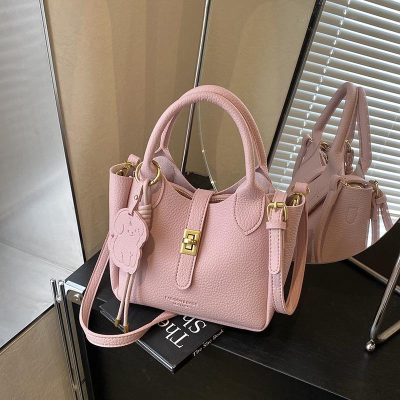 Simple hand bucket bag, new fashionable versatile shoulder bag, high-end trendy messenger bag