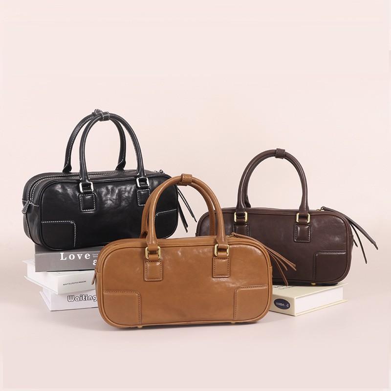 New Vegetable Tanned Leather Pillow Bag Women's Retro Niche Handbag Fashionable High-end Commuter Portable Boston