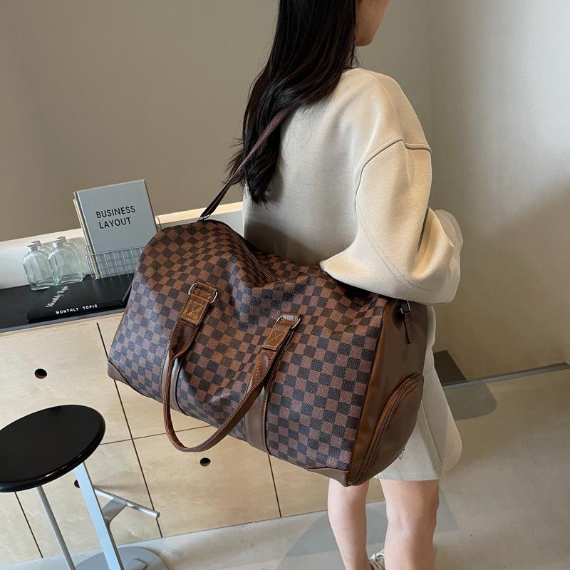 Borsone PU a quadri borsa da viaggio di alta gamma portatile impermeabile leggera grande capacità borsa da cabina