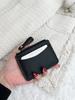 Slim lightweight zipper pouch made of premium material, practical for storing cards, cash and small change, portable design
